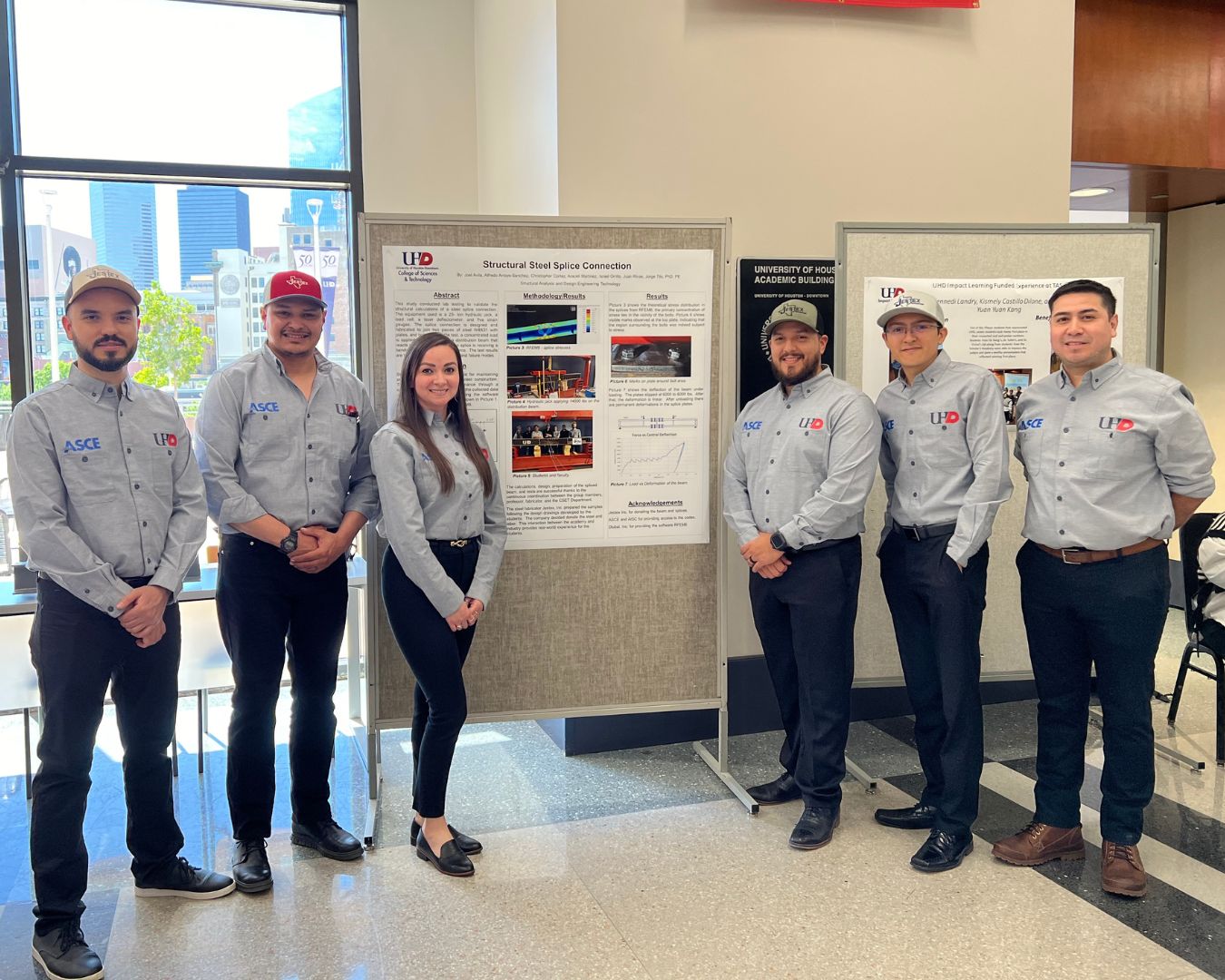 Students standing in front of posters