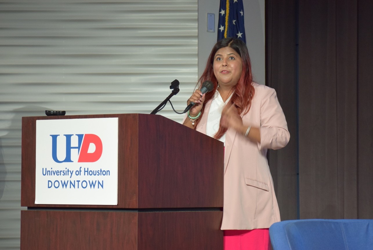 ALPFA Houston President Adriana Rodriguez-Villarreal giving remarks