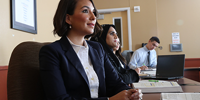 MBA female student at desk