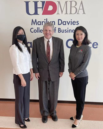 Jessie Wang (Director of New Media), Dean Gengler and Dr. Liu (Chair of Accounting) 