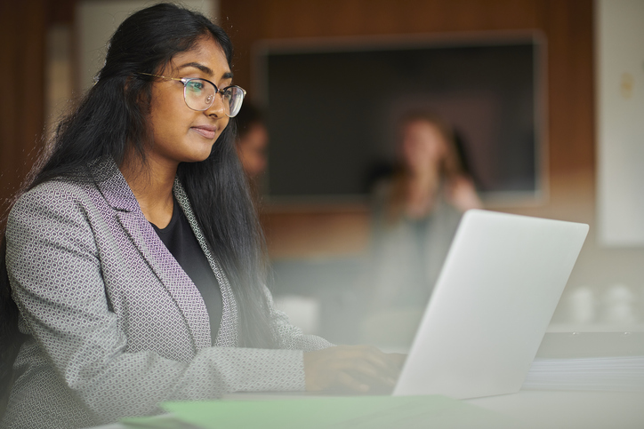 female student on a computer