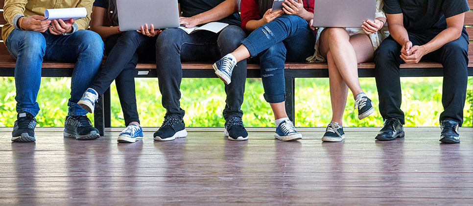 Students interacting with one another