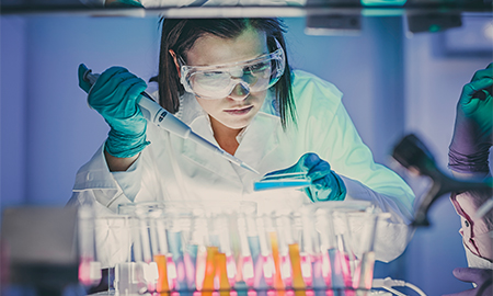 Girl working with chemicals in lab