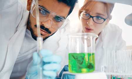 Man and woman doing science experiment