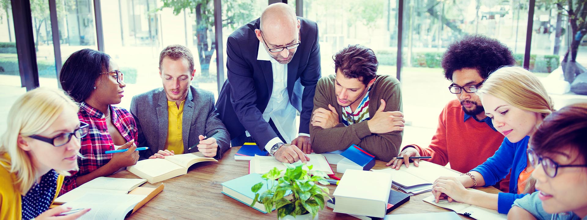 image of faculty memeber helping 