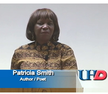 Patricia Smith at podium reading her poetry