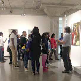 students in the OKane Gallery - Mark Cervenka speaking