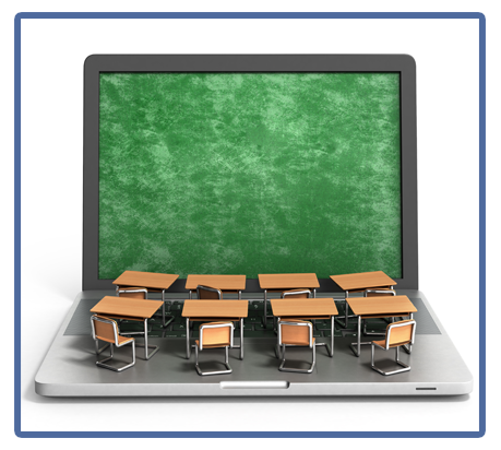 tiny student desks on the keyboard of a laptop computer.