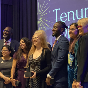 CHSS faculty on stage recognized at tenured