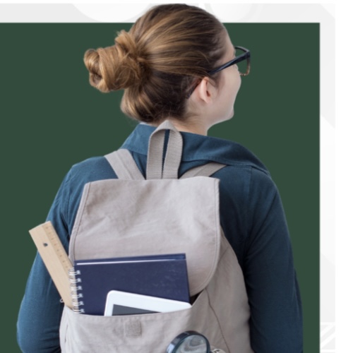 Student looking at a white board