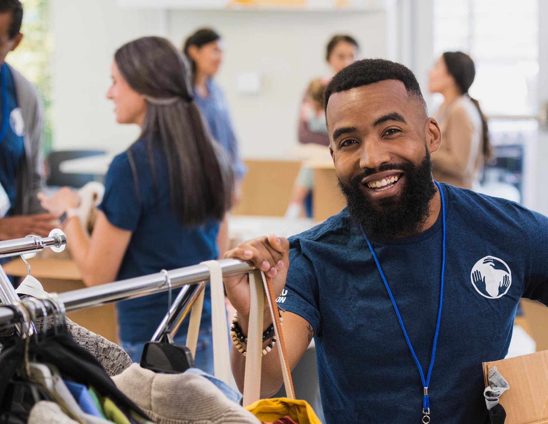 Volunteer helping in a clothes drive