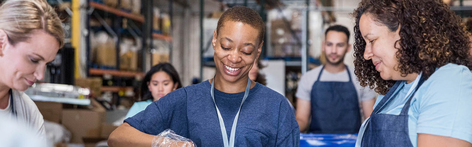 Social Workers volunteering is helping with food donations
