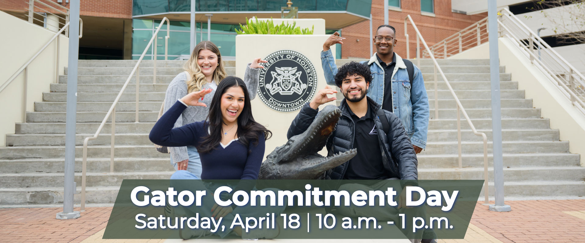 UHD students with gator hand sign