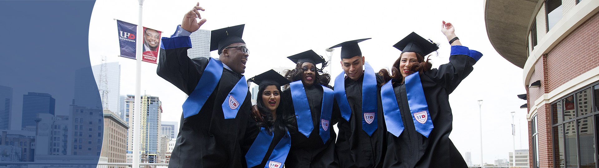 students celebrating graduation
