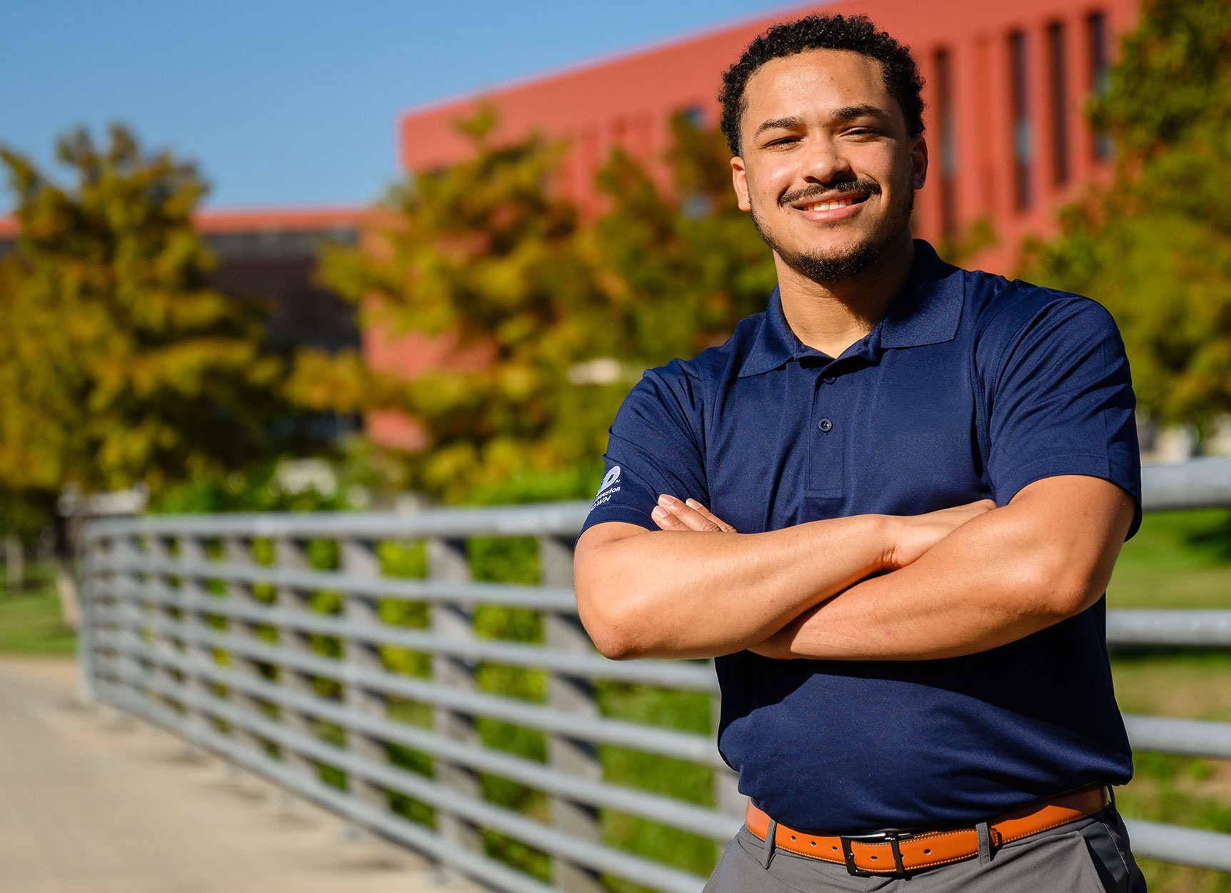 UHD graduate student graduate student smiling