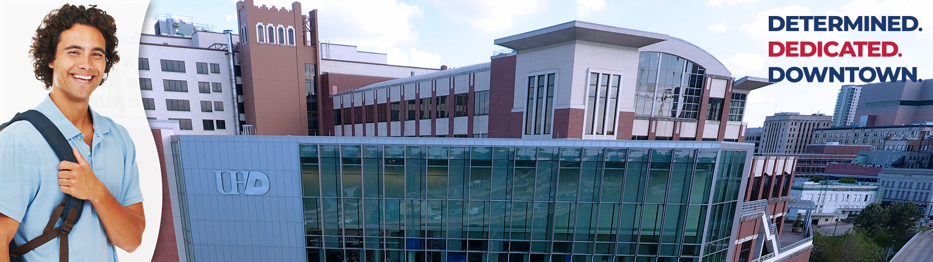 Student and view of Academic Building and Welcome Center