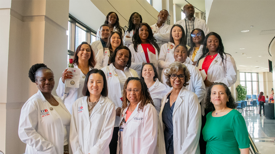 Group photo of nursing students, faculty and staff