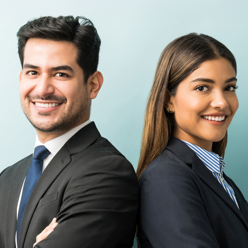 young professionals standing back to back