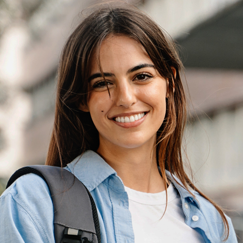 international student smiling at the camera