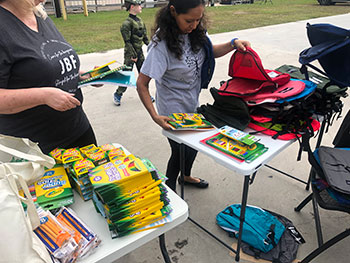 students preparing backpacks