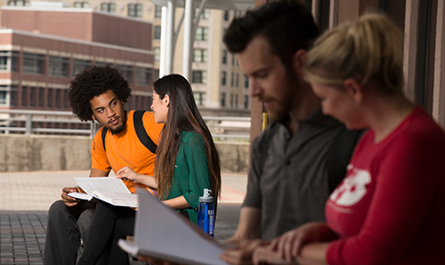 students looking over material