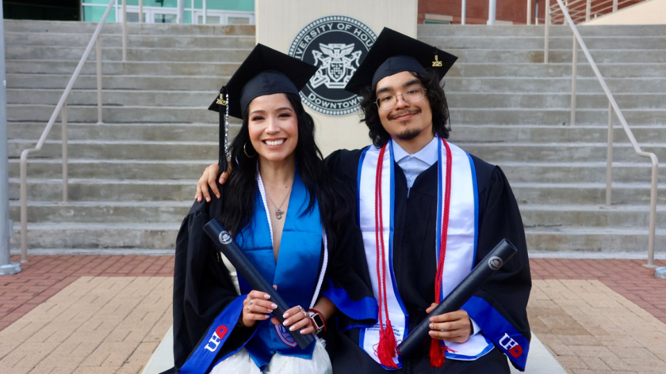 Mother and Son posing for a graduation photo