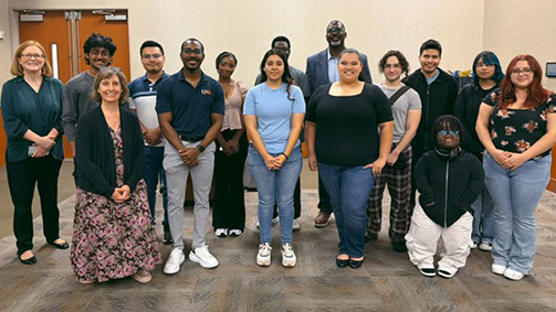 Students and professors who participated in the photography exhibition