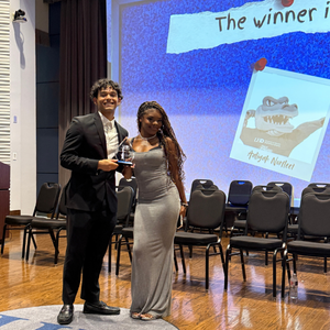 Aliayah Norfleet smiles while receiving an award at the university's one main event student awards