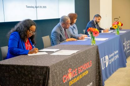 President Blanchard and Provost Bordelon signing memorandum of understanding