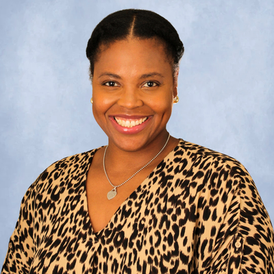 Alexis Nwagui smiles. Nwagui is an Information Technology Project Coordinator at the University of Houston-Downtown.