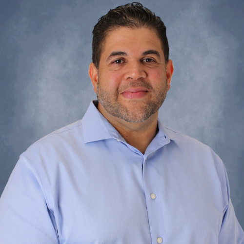 Construction project manager at the University of Houston-Downtown, Juan Valdez smiles