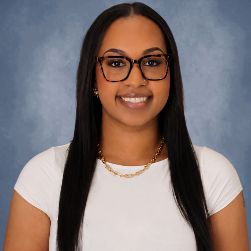 Moriah Roberts, Coordinator at University of Houston-Downtown's Gator Resource Center, smiles
