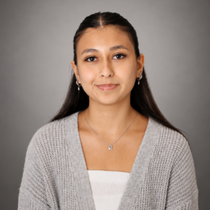 nataly arreazola smiles. Arreazola is a library assistance at the wi dykes library at the university of houston downtown in houston, texas.