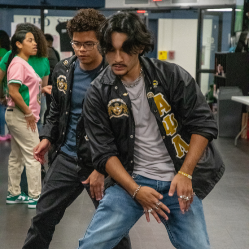 Students in a greek organization dance at the university of houston-downtown
