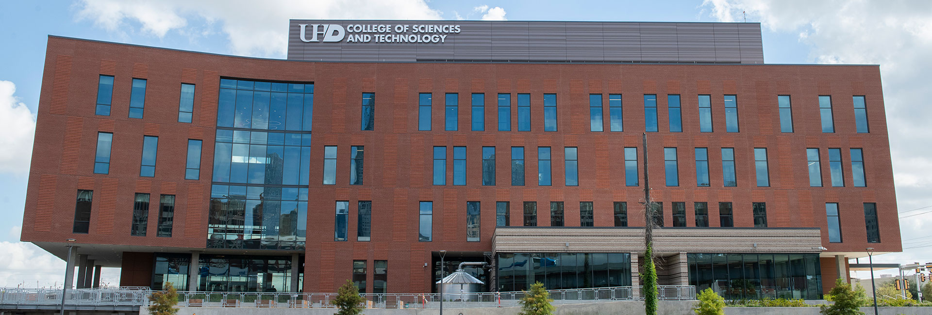 Goal 5 Banner: College of Sciences and Technology Building.