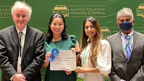 Honors students Tooba Narejo and Gladys Chan with Mike Sloane, moderator and Suketu Bhavsar, President.