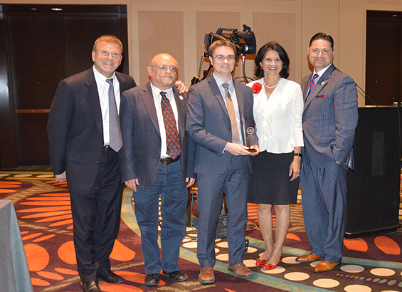 Dr. Gregory Dement accepted the Regents’ Academic Excellence Award on behalf of University of Houston Downtown