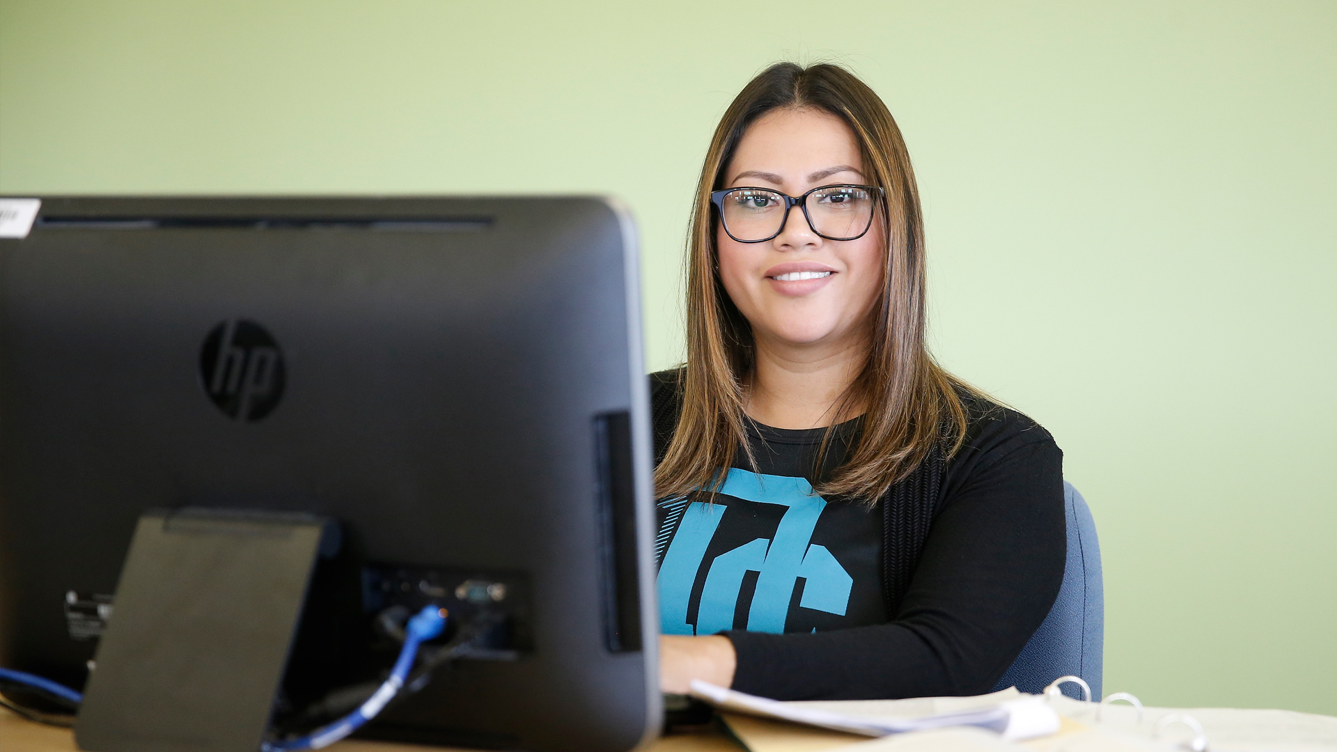 Female UHD student on a laptop