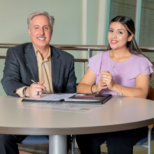 Brett hobby sits next to Valerie Parada at Marilyn Davies College of Business at University of Houston Downtown