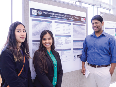 Group of students presenting their research